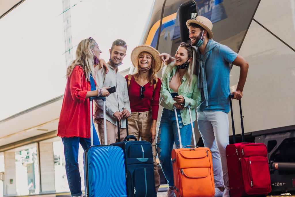 multiracial-group-people-walking-train-station